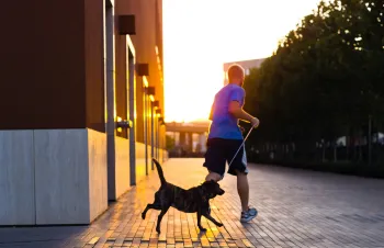 Man with dog running