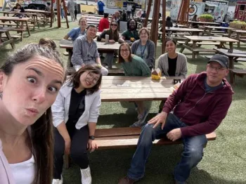 people at picnic tables