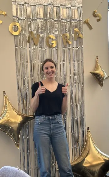 person giving thumbs up