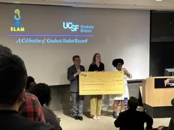person receiving oversized check