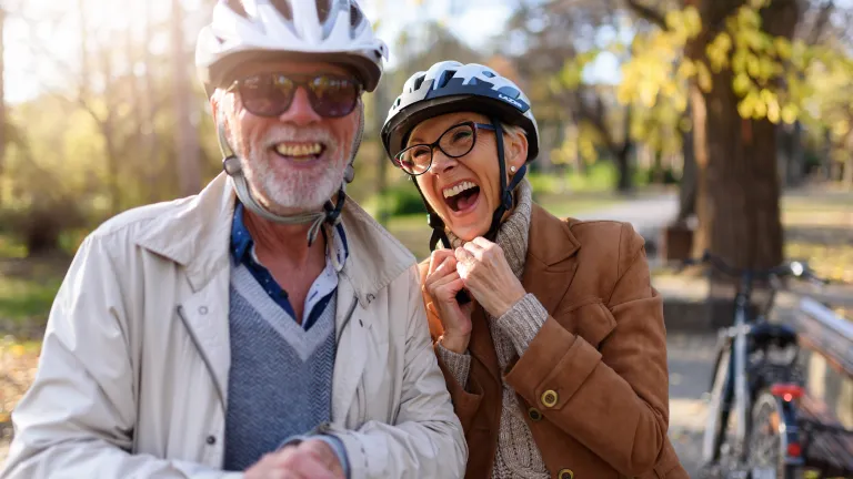 Bicyclists laughing