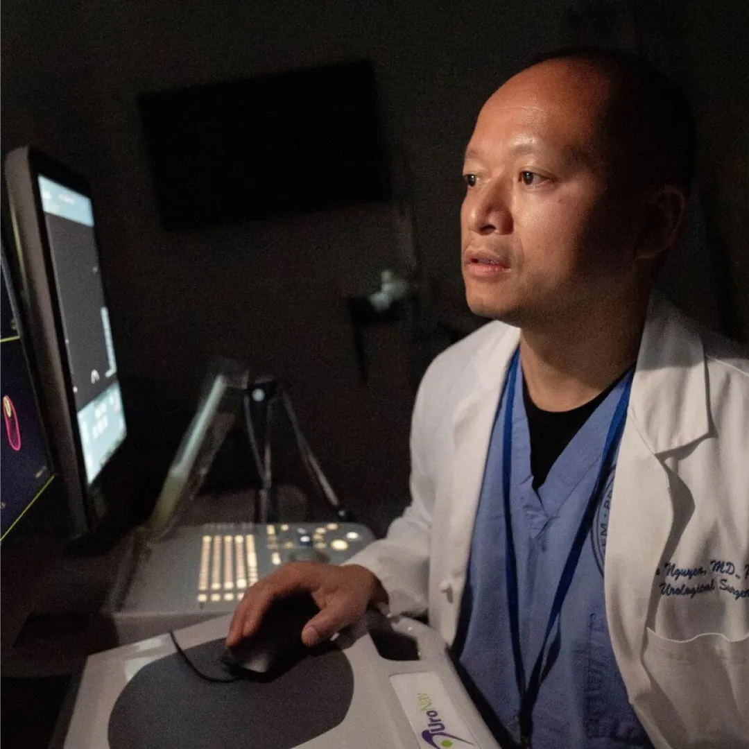 Dr. Hao Nguyen at computer