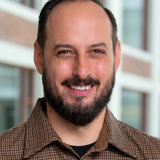 Dr. Aaron Huebner