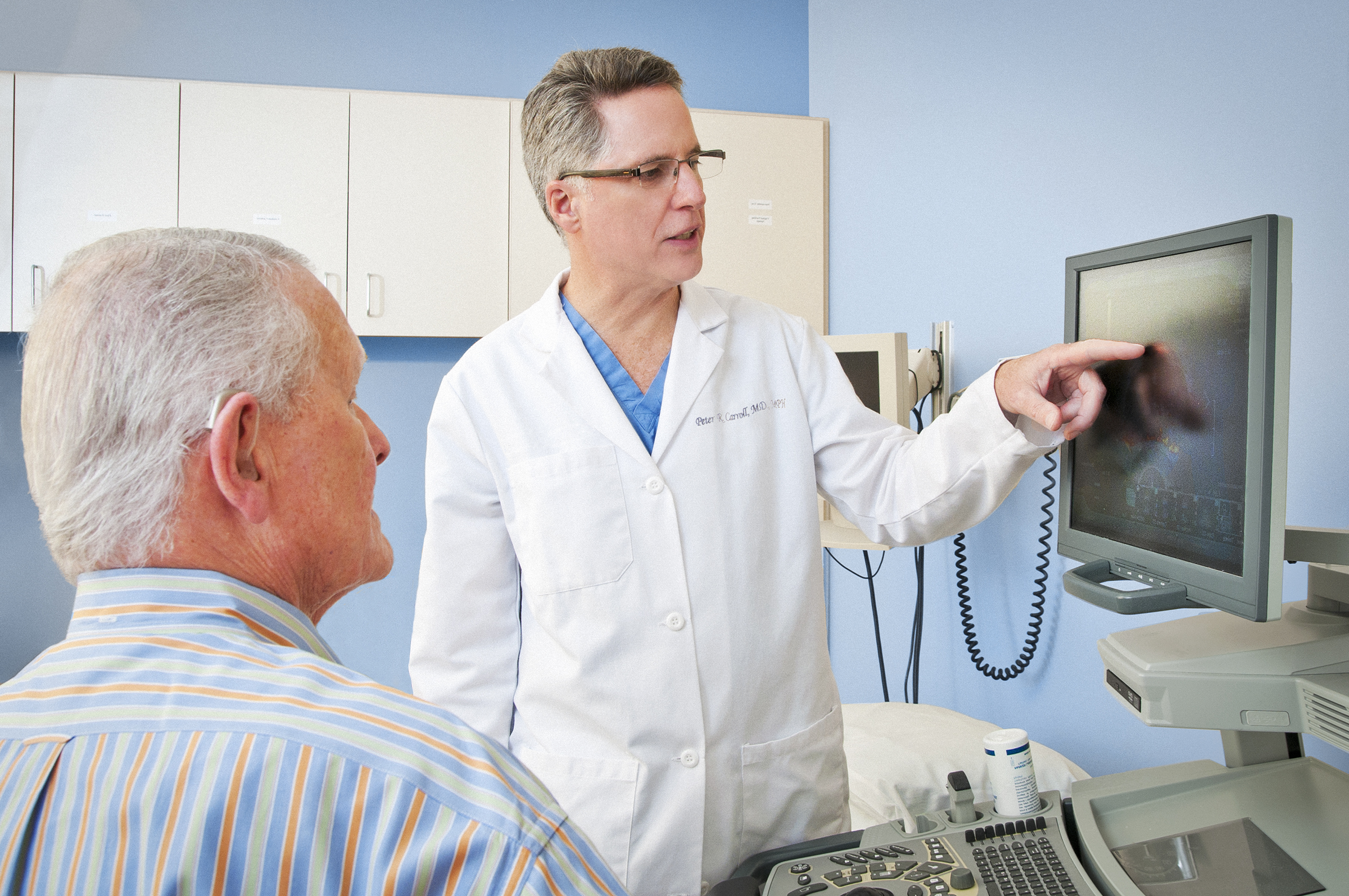 Dr. Peter Carroll and patient