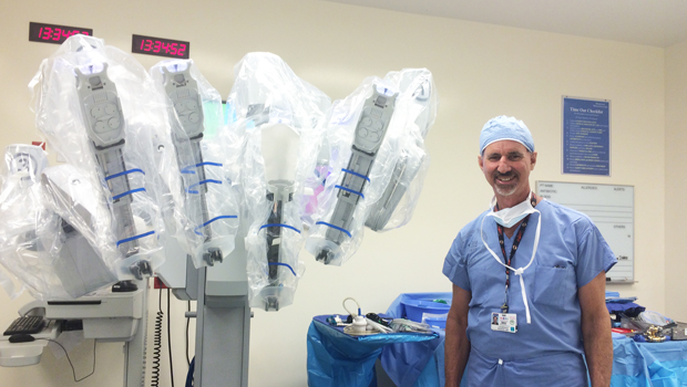 Robotic arms are prepped prior to surgery allowing manipulation of the instruments through mini laparoscopic incisions Dr Baskin with robot