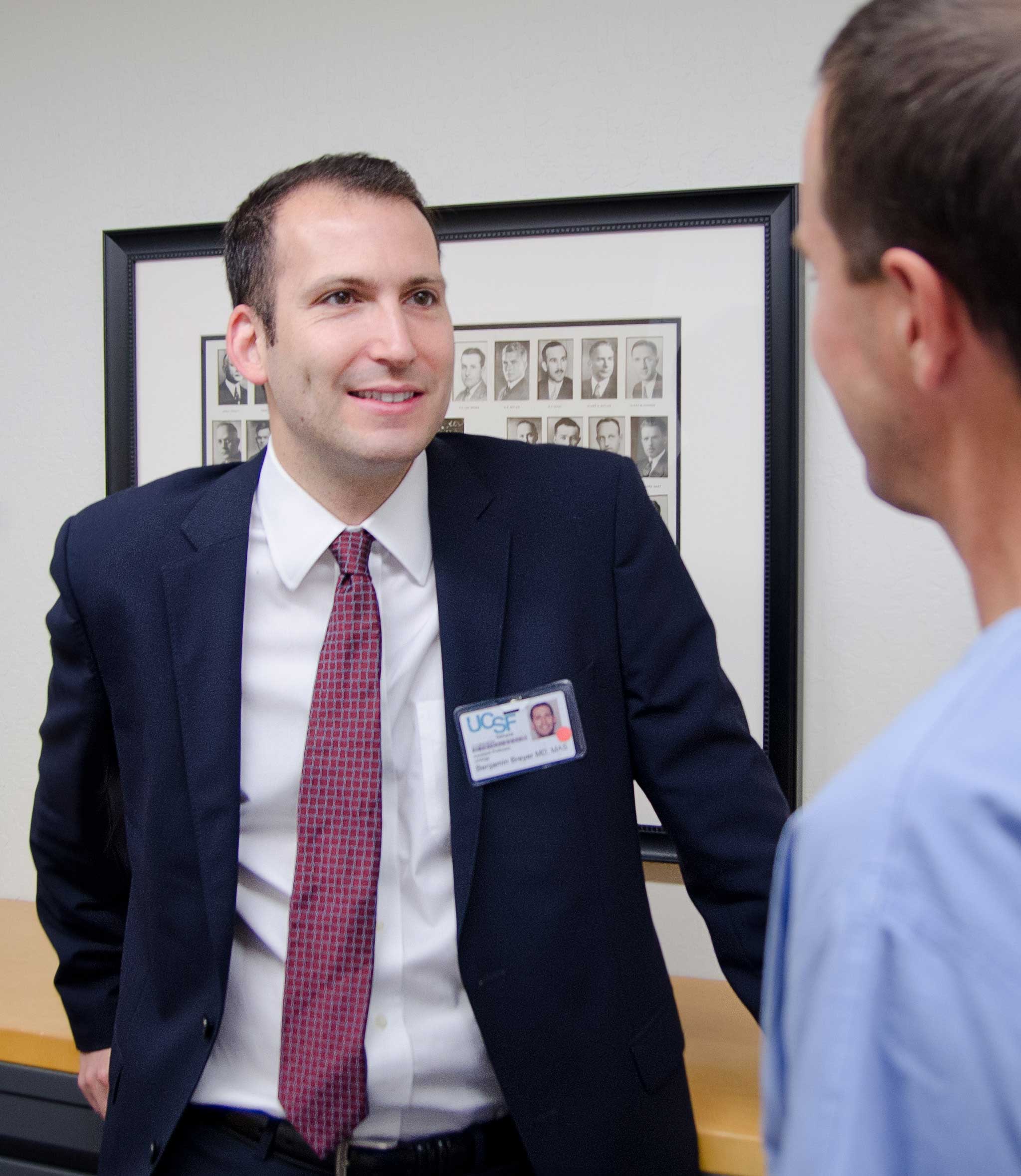 Ben Breyer, MD, MAS, Assistant Professor, speaks with colleague at recent UCSF Urology meeting Ben Breyer, MD, MAS, Assistant Professor, speaks with colleague at recent UCSF Urology meeting