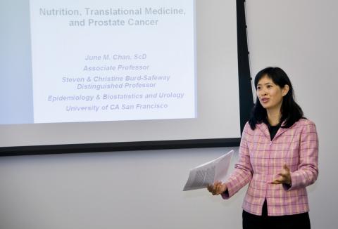Dr. June Chan lecturing on her research